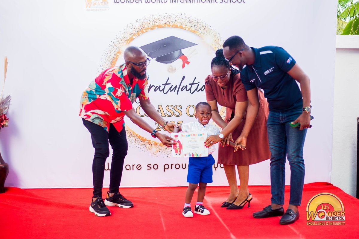 A student receiving their diploma at a graduation ceremony